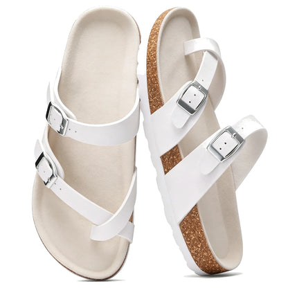 White toe-loop cork footbed sandals with double buckles, pair top view